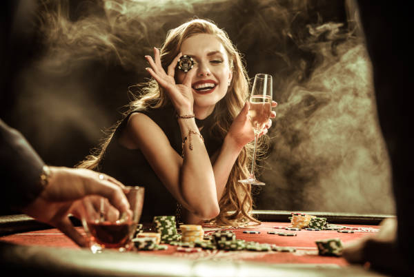 Girl holding casino chip